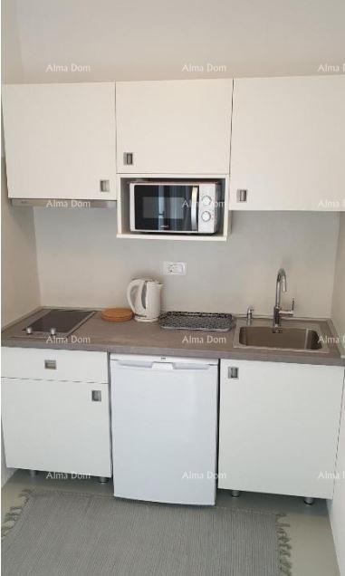 Enosobno prenovljeno stanovanje v centru Rovinja 11