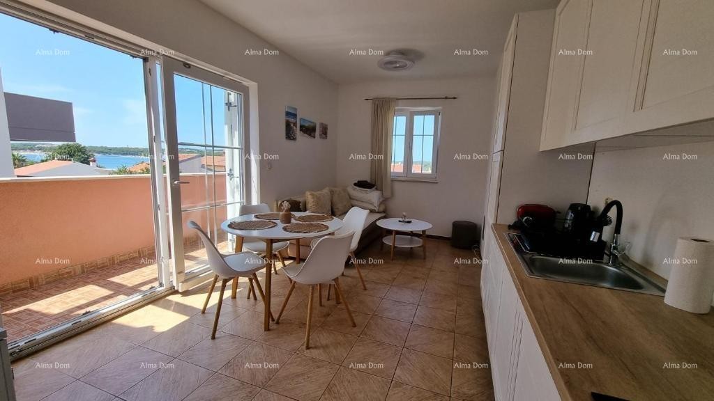 Eccellente opportunità! IMMOBILE CON PERMESSO DI UTILIZZO. Vendita esclusiva di un appartamento in posizione privilegiata con giardino e posto auto. Vista mare! Pošesi, Medulin!! 11
