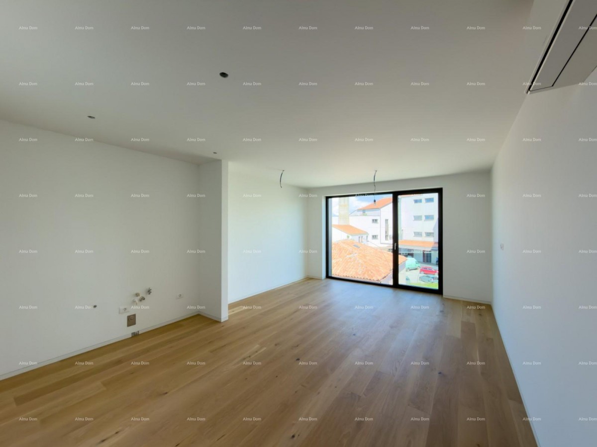 Sale of apartments in a residential-commercial building with a sea view, center of Umag! / S9a 16