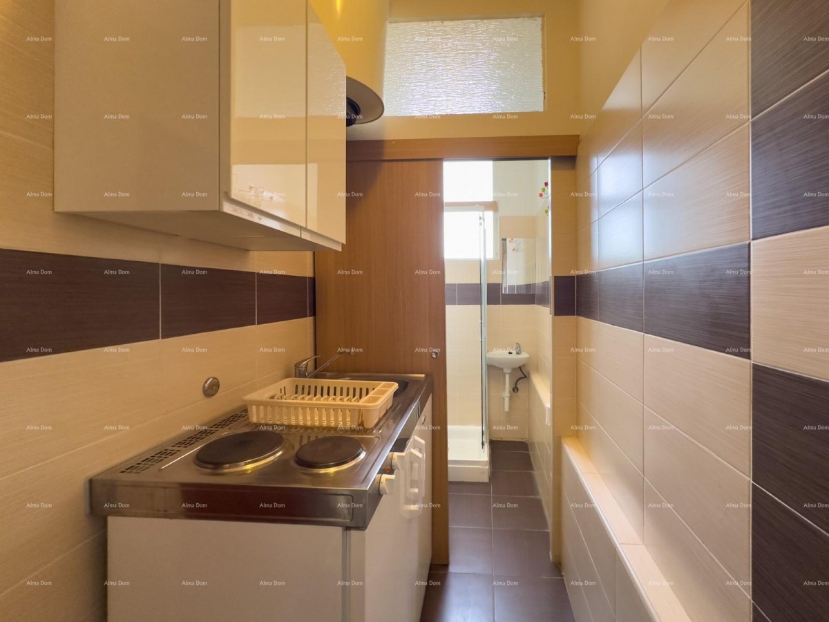 Sale of an apartment in the center with 4 residential units, Pula! 34