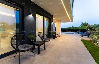 A modern house with a pool in a great location, Medulin!