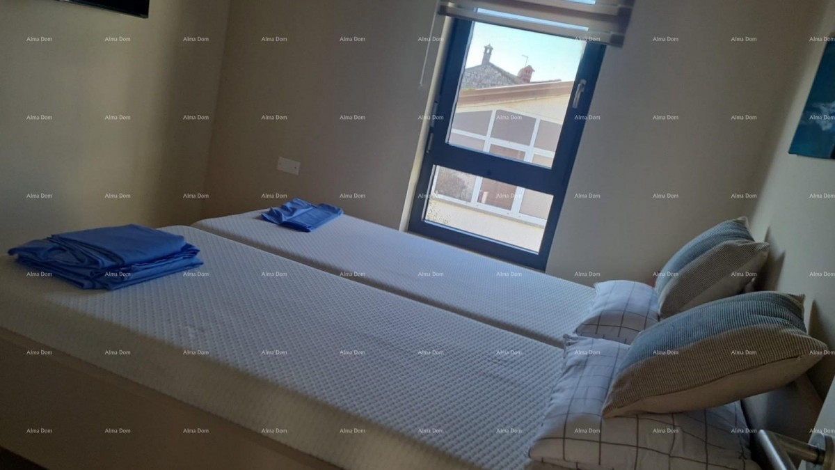 Moderen apartma v bloku E, s parkirnim mestom in shrambo v bližini Umaga! 9