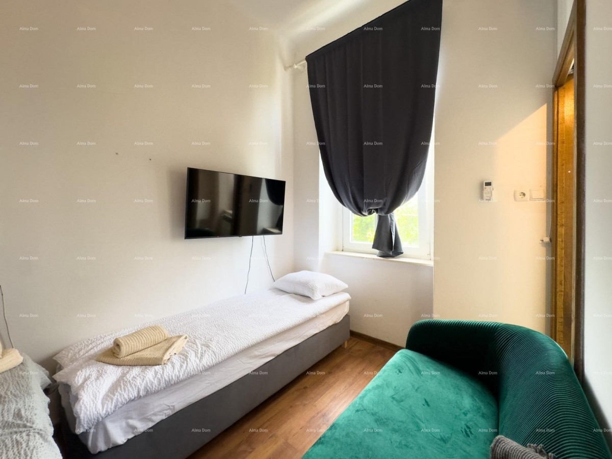 Sale of an apartment in the center with 4 residential units, Pula! 16