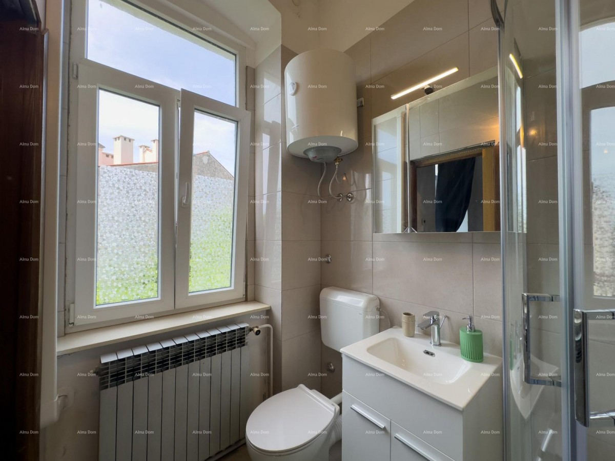 Sale of an apartment in the center with 4 residential units, Pula! 19