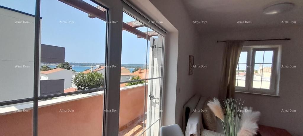 Eccellente opportunità! IMMOBILE CON PERMESSO DI UTILIZZO. Vendita esclusiva di un appartamento in posizione privilegiata con giardino e posto auto. Vista mare! Pošesi, Medulin!! 4