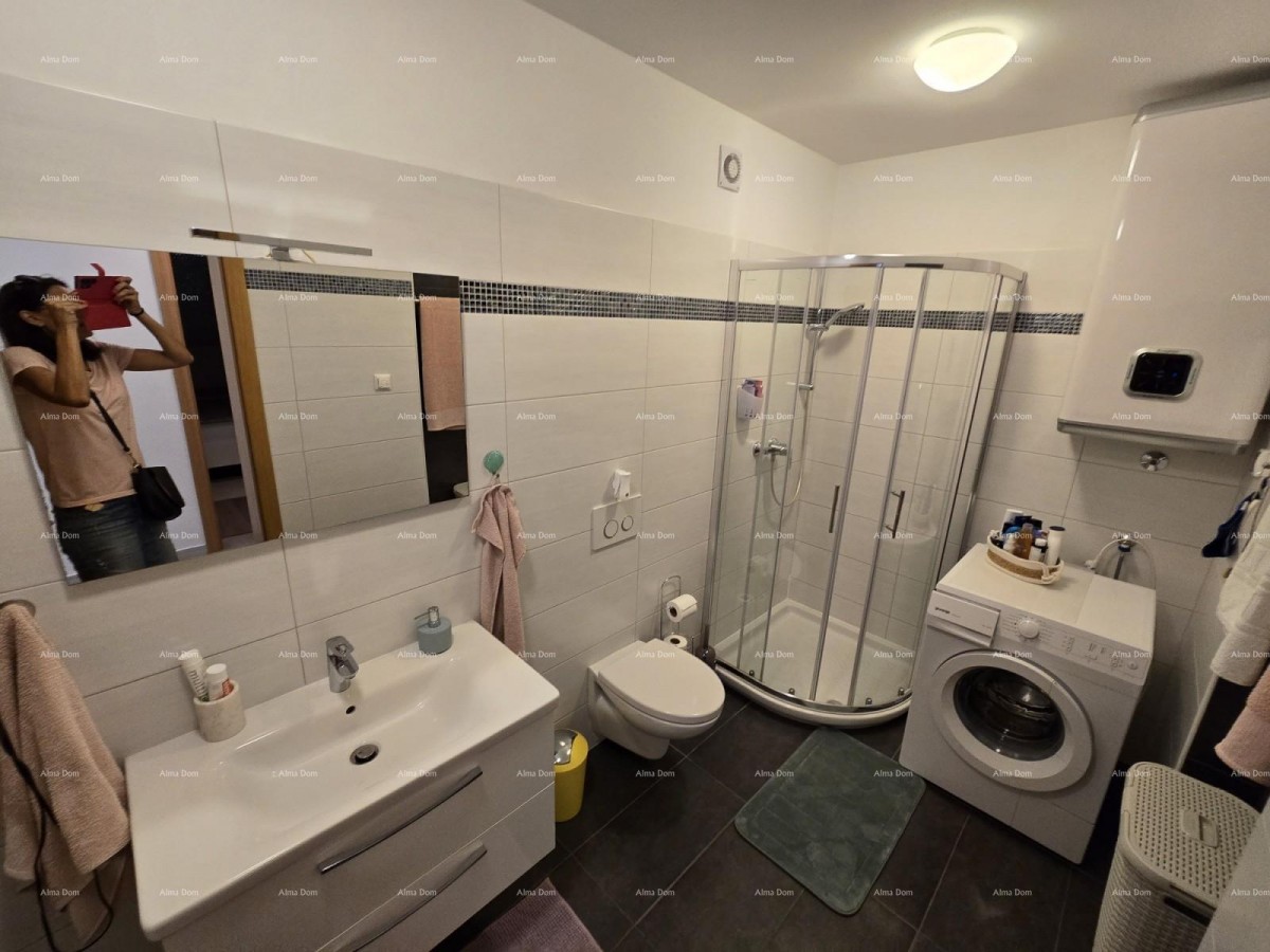 Modernly furnished apartment near the center of Pula with a garden and parking. 13