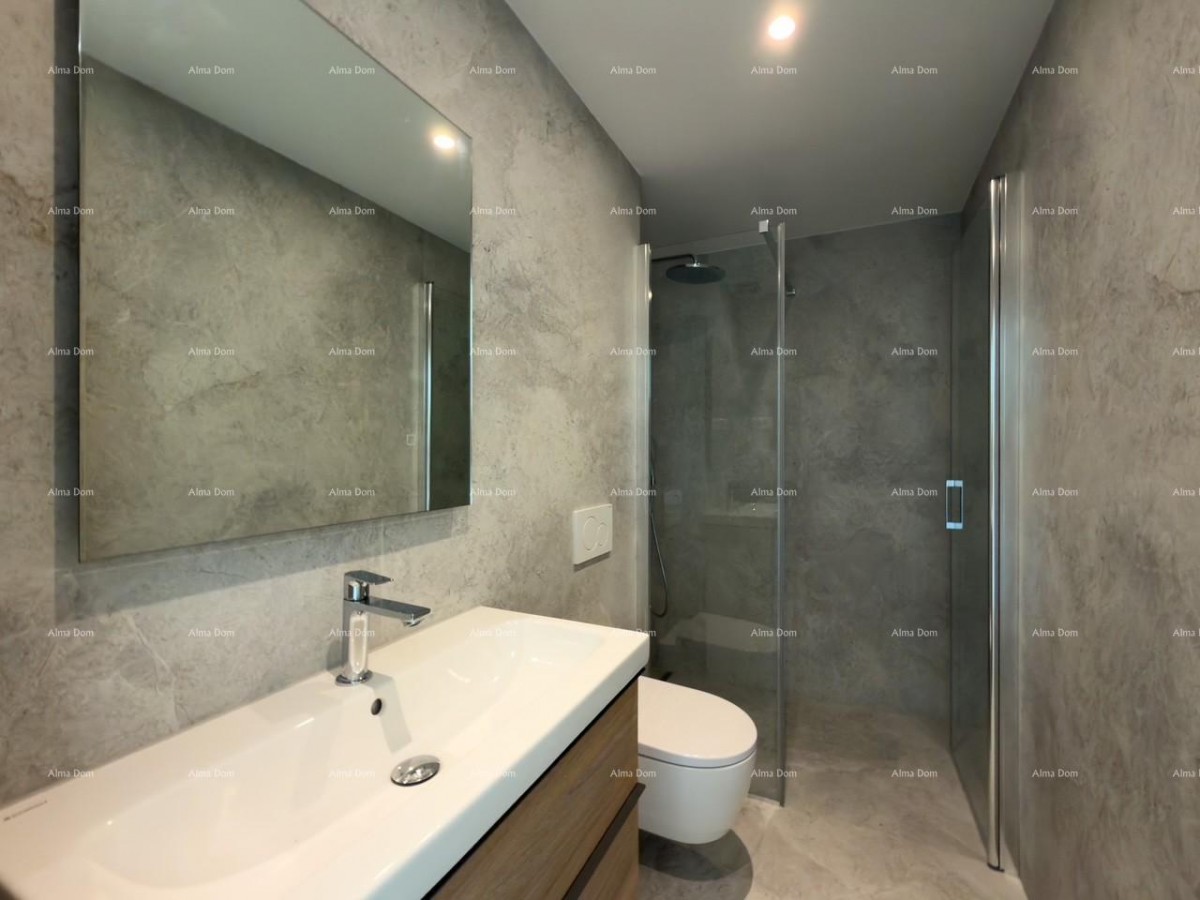 Sale of apartments in a residential-commercial building with a sea view, center of Umag! / S9a 12