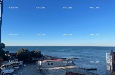 Sale of apartments in a residential-commercial building with a sea view, center of Umag!