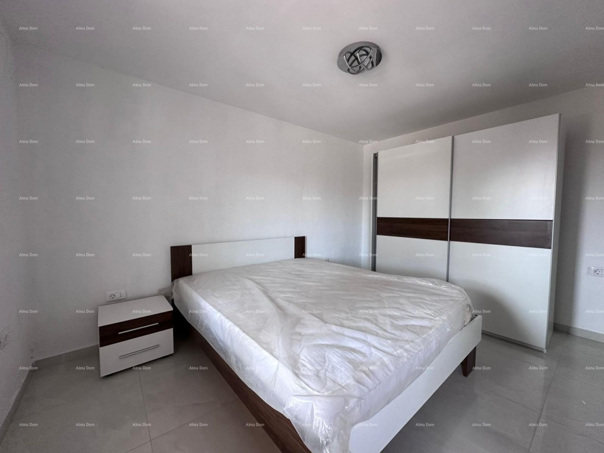 Prodaja fantastične hiše s tremi stanovi v Medulinu! 31