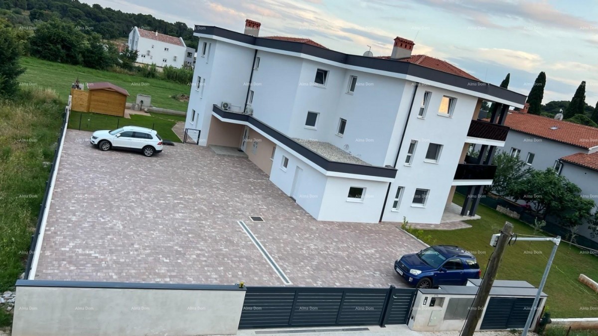 Moderno trilocale con grande terrazza e 2 posti auto 6