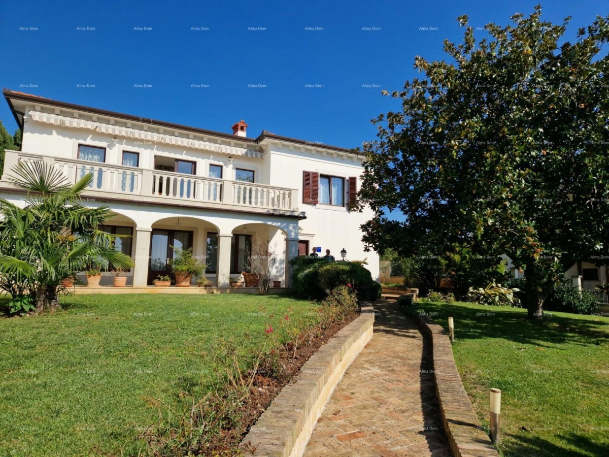 UMAGO - Spaziosa casa con ampio giardino, prima fila al mare 1