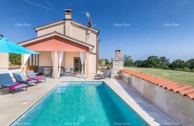 A beautiful house with a pool, surrounded by greenery!