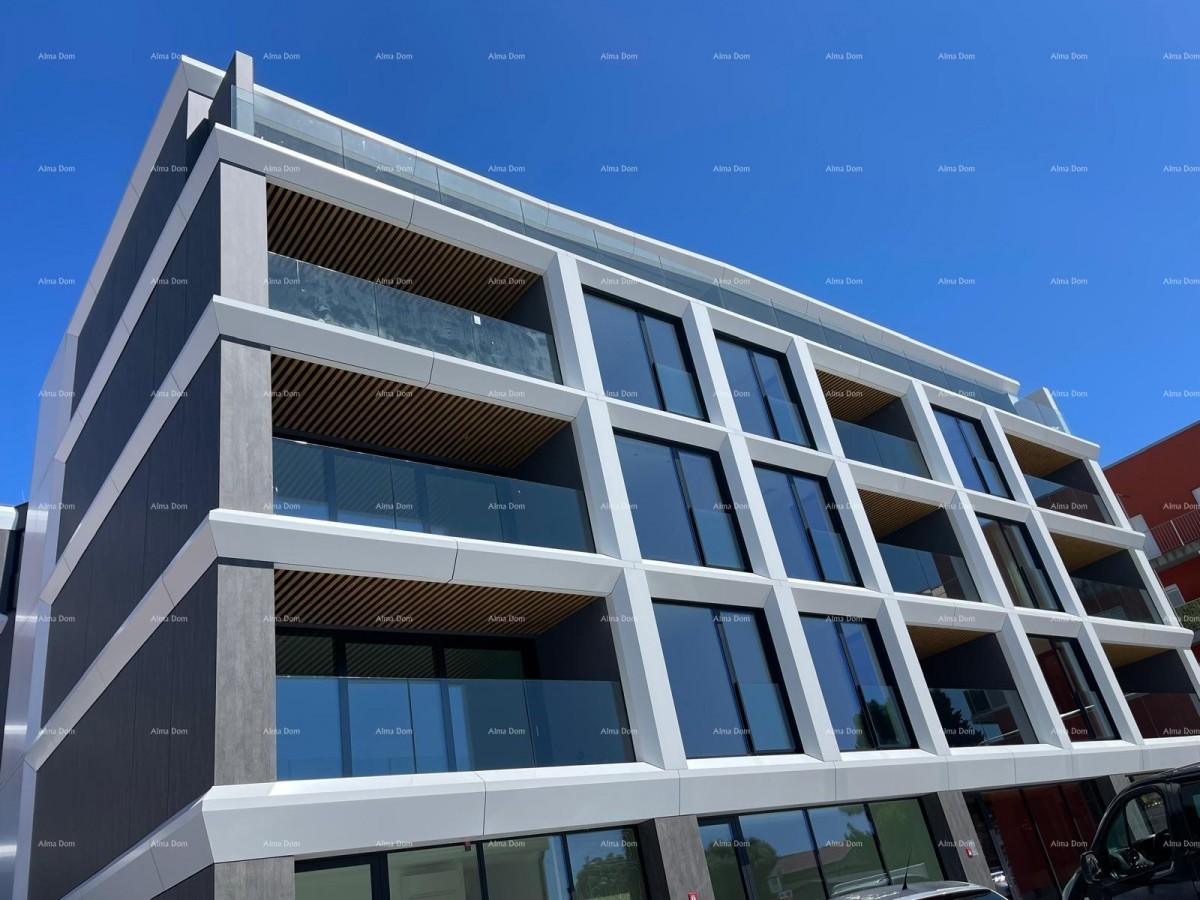 Apartments for sale in a residential and commercial building with a sea view, center of Umag! 7