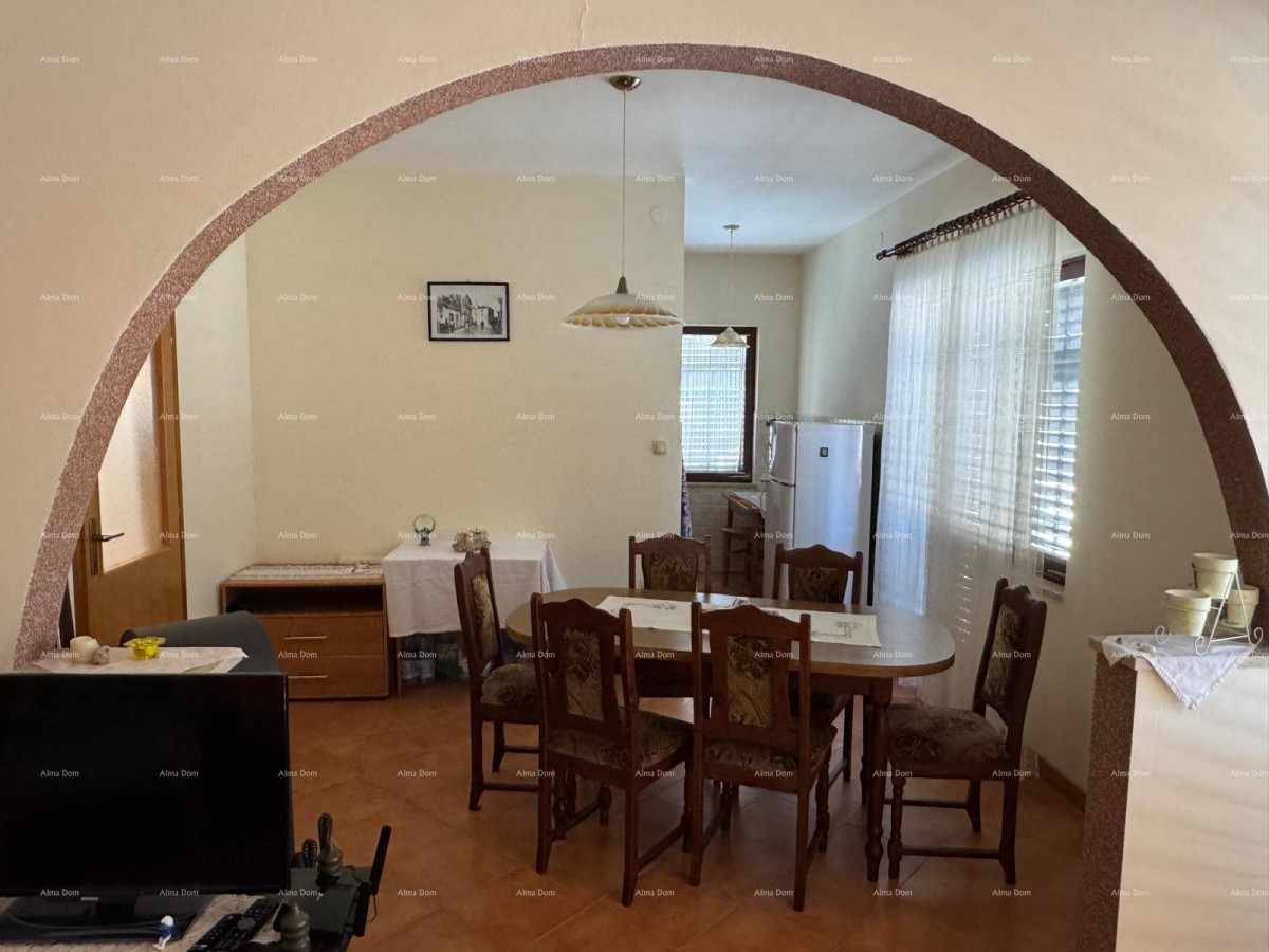 Kuća u centru Marčane s 2 stana, konobom i radionom 19