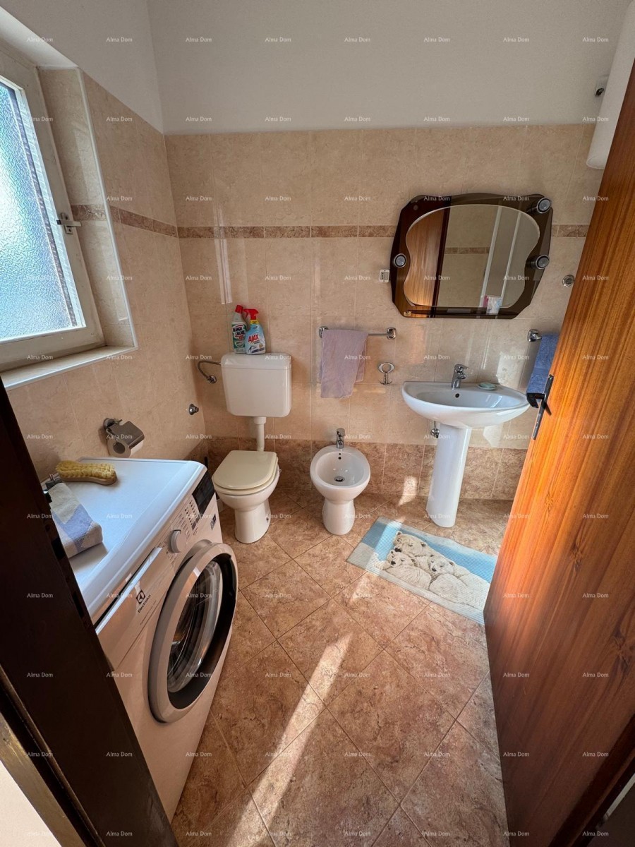 Kuća u centru Marčane s 2 stana, konobom i radionom 5