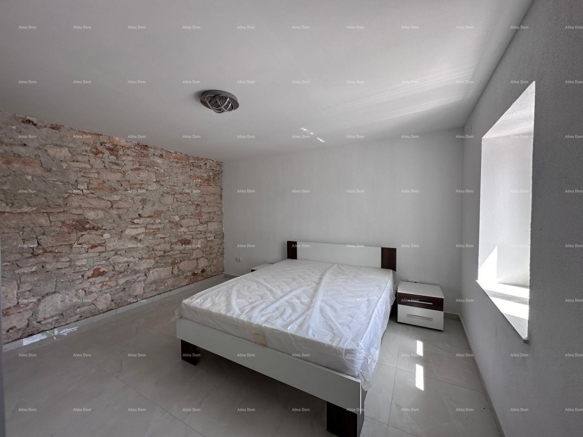 For sale: a fantastic house with three apartments in Medulin! 38