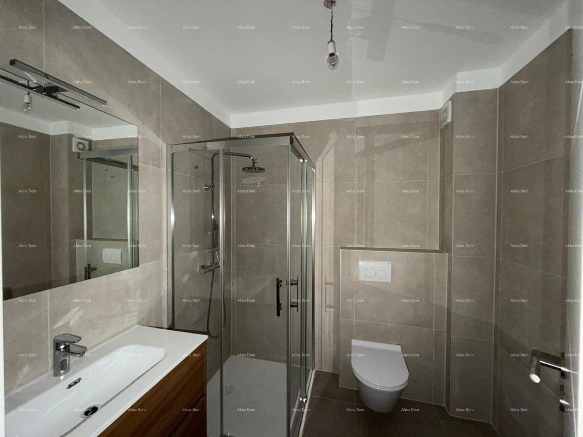 Novogradnja. Blizina gradske tržnice.  Prodaja stanova . Pula, 19