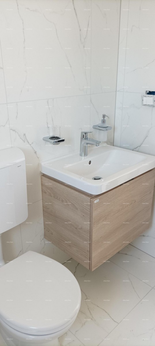 Новый многоквартирный дом недалеко от Ровиня 13