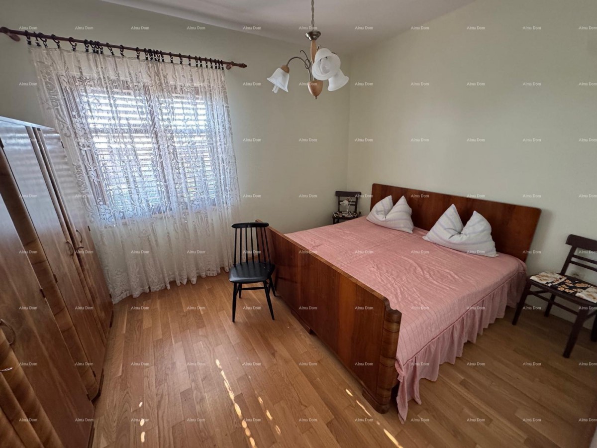 Kuća u centru Marčane s 2 stana, konobom i radionom 15