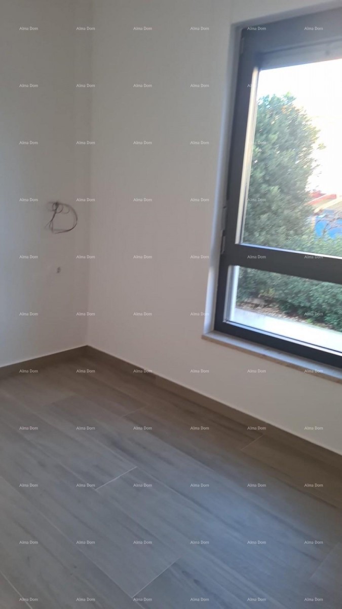 Moderen apartma v bloku A z vrtom in parkirnim mestom, blizu Umaga! 10