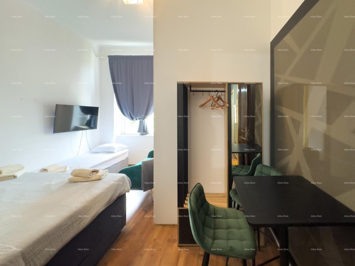 Sale of an apartment in the center with 4 residential units, Pula! 13