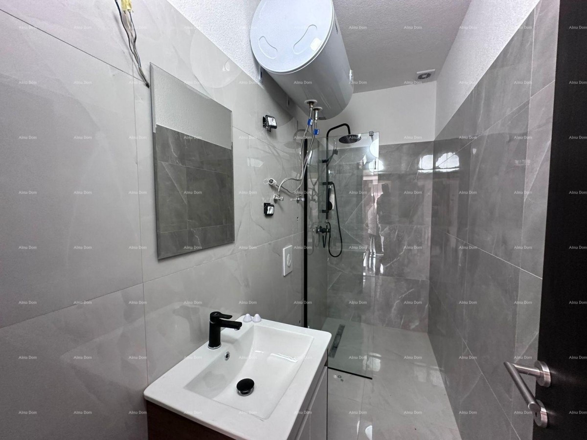 For sale: a fantastic house with three apartments in Medulin! 37