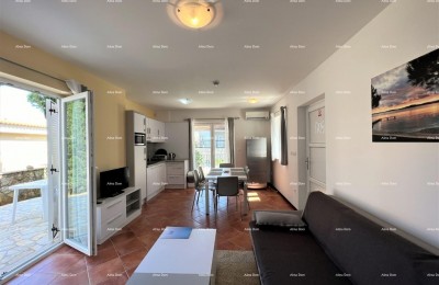 MEDULIN, POŠESI, APARTMENT 73.54 m² WITH GARDEN, 150 m FROM THE SEA
