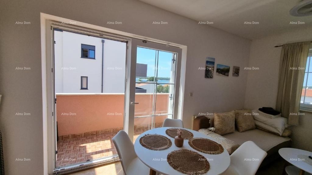 Excellent opportunity! Exclusive sale of an apartment in a prime location with a garden and parking space. Sea view! Pošesi, Medulin!! 9