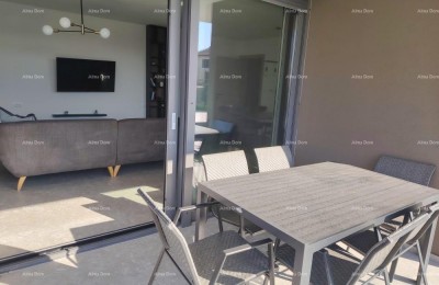 Top-notch three-bedroom apartment with a garden and pool, furnished