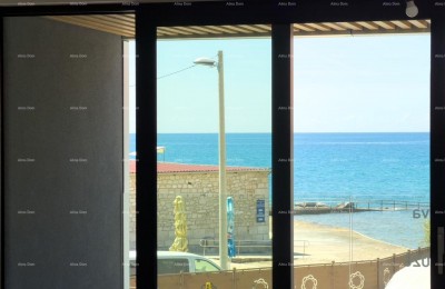 Sale of apartments in a residential-commercial building with a sea view, center of Umag! S3