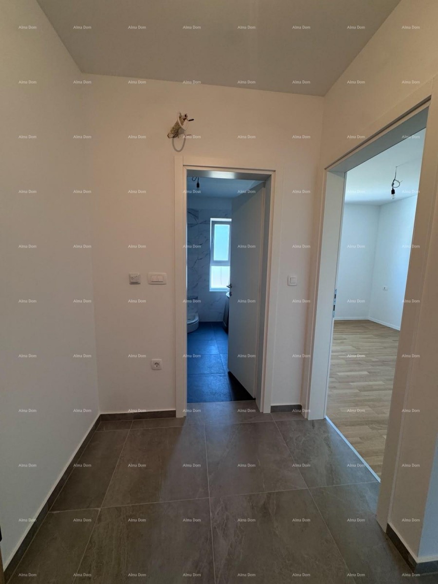 Moderno trilocale con grande terrazza e 2 posti auto 12