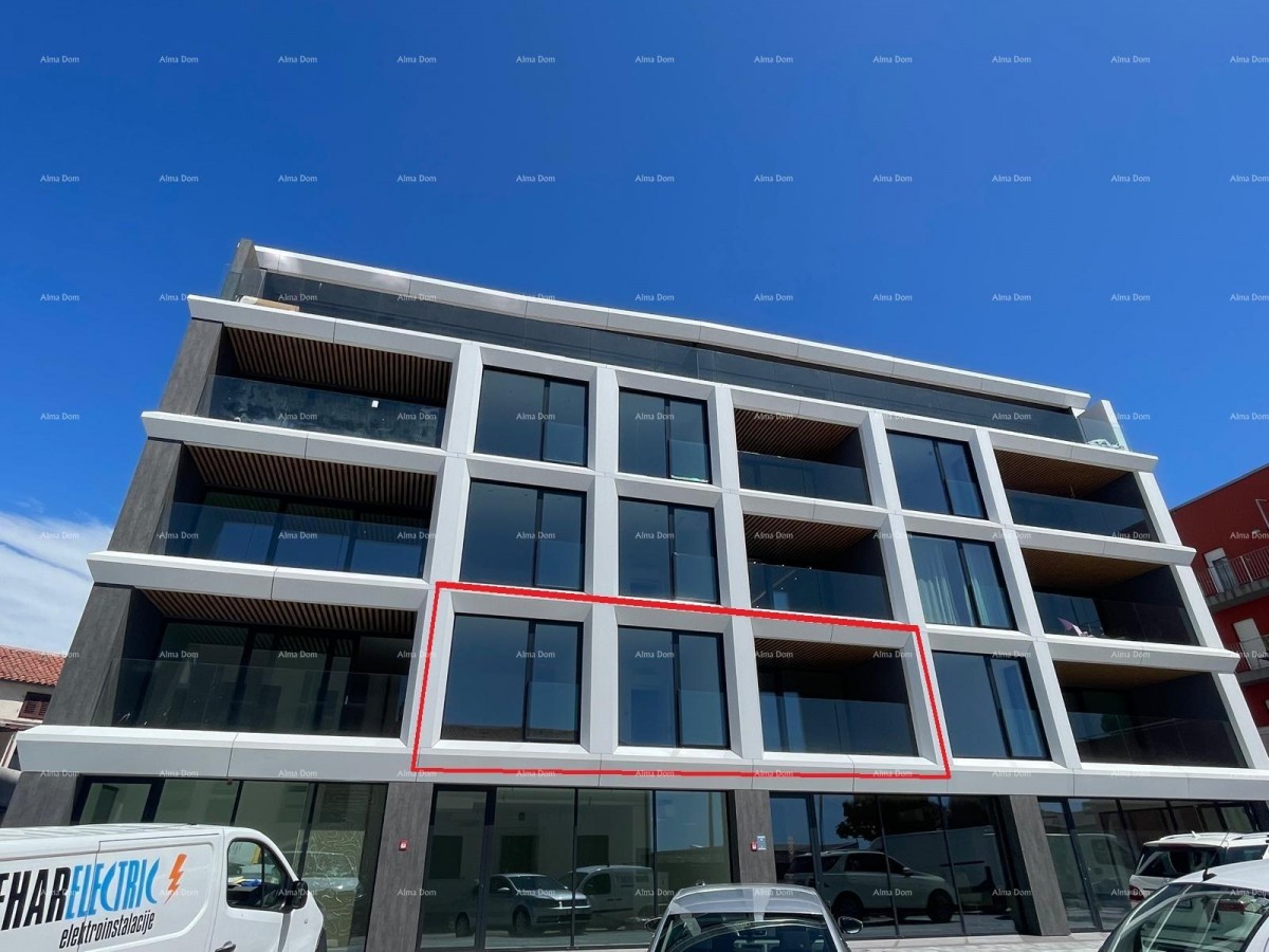 Apartments for sale in a residential and commercial building with a sea view, center of Umag! 8