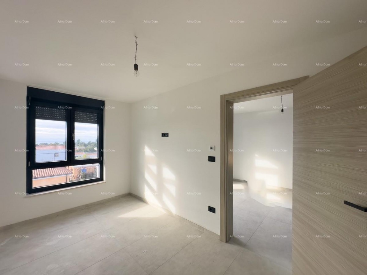 Vendiamo un appartamento in un nuovo edificio a Banjole. 14