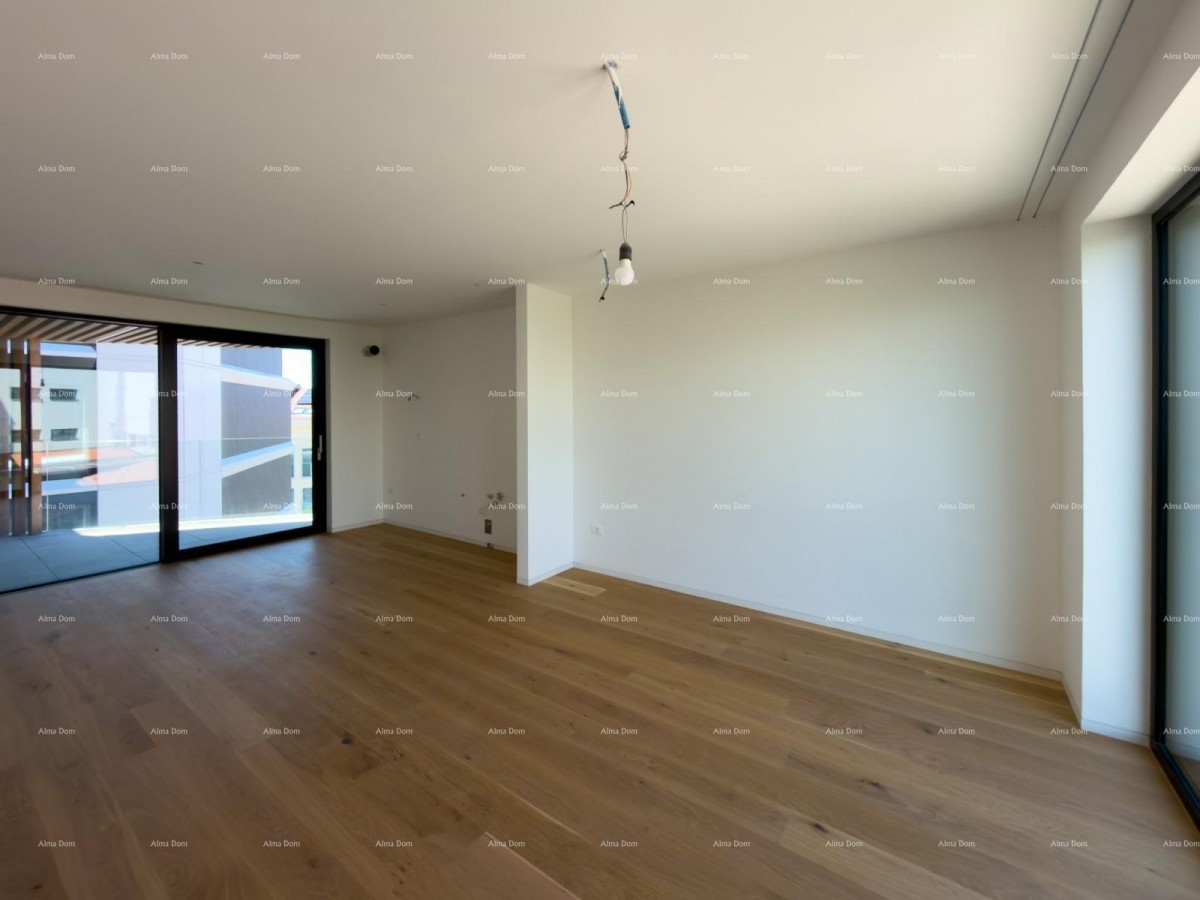 Sale of apartments in a residential-commercial building with a sea view, center of Umag! / S9a 18