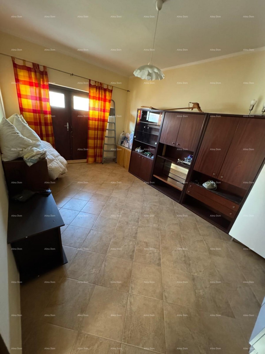 Kuća u centru Marčane s 2 stana, konobom i radionom 6