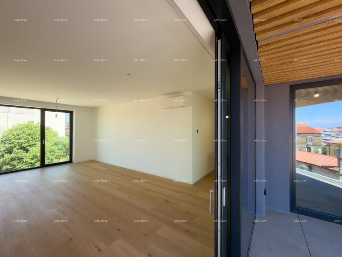Sale of apartments in a residential-commercial building with a sea view, center of Umag! / S9a 23