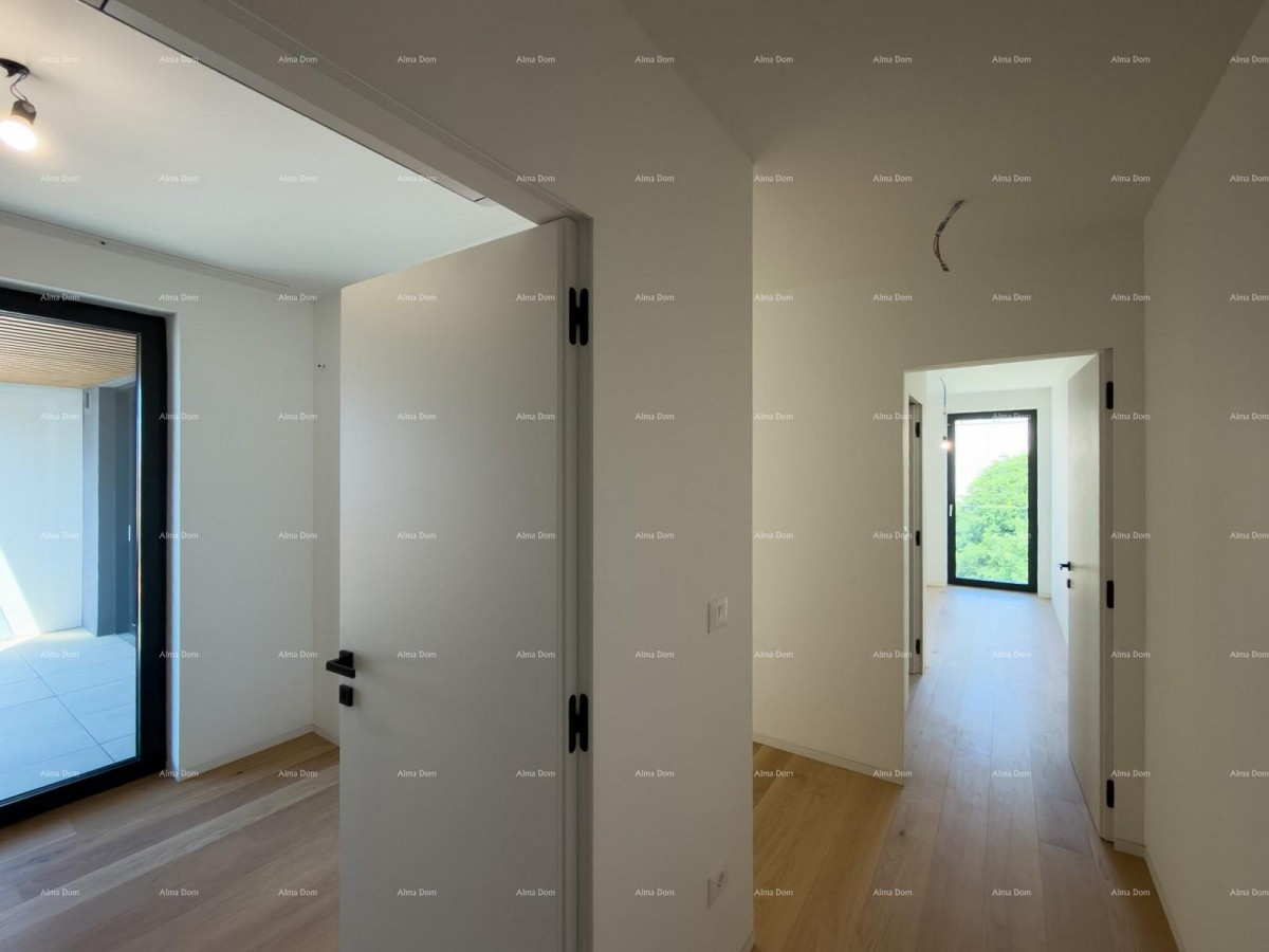 Sale of apartments in a residential-commercial building with a sea view, center of Umag! / S9a 6