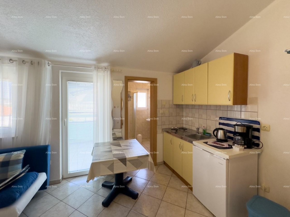 МЕДУЛИН! Студия-апартамент на втором этаже многоквартирного дома. 4