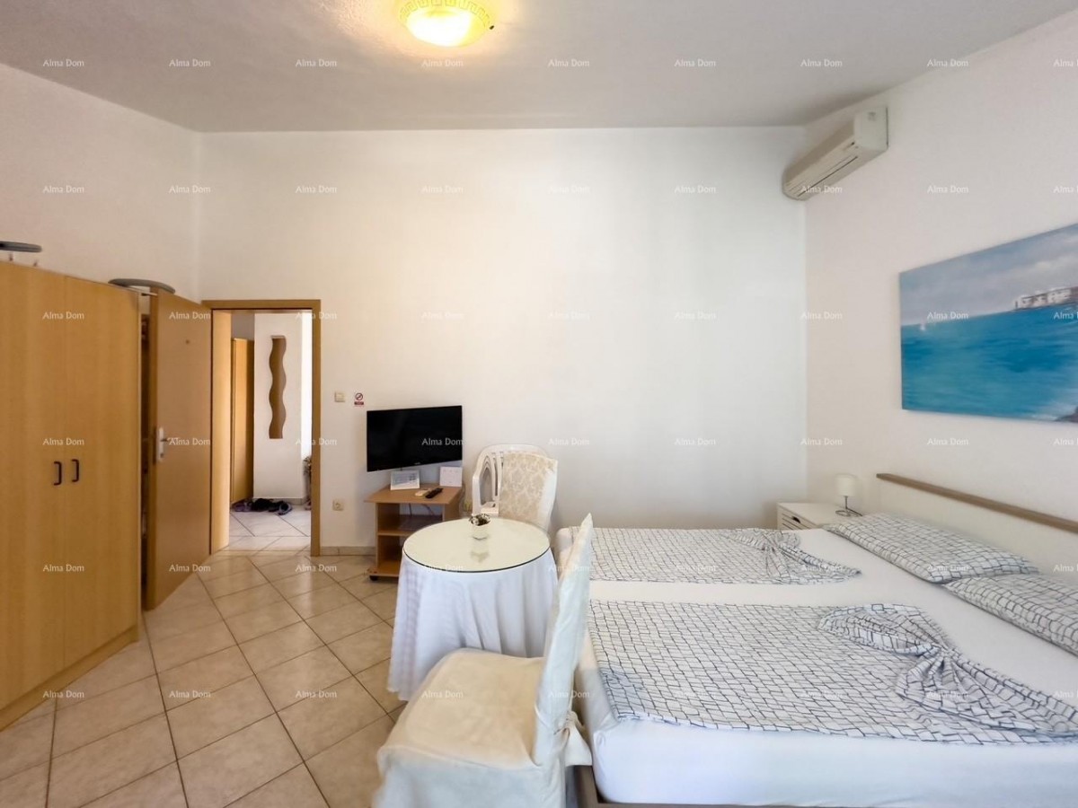 МЕДУЛИН! Студия-апартамент на втором этаже многоквартирного дома. 11