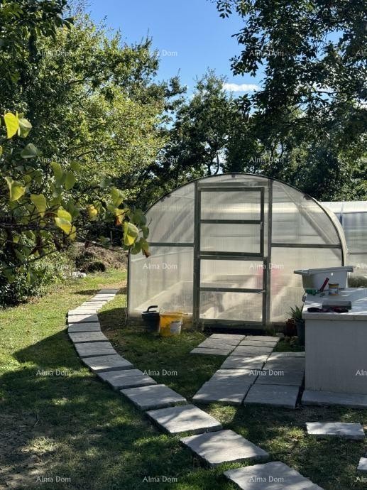 The beautiful estate for sale is surrounded by forests and vineyards, offering views of Gračišće and Učka! 12