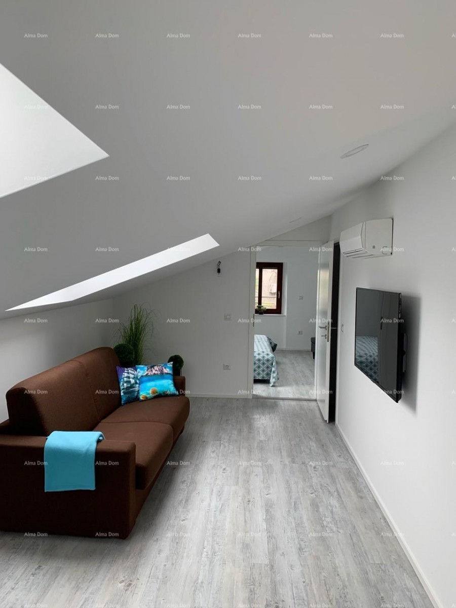 Прекрасный дом с тремя зарегистрированными апартаментами в старой части города Пореч! 44