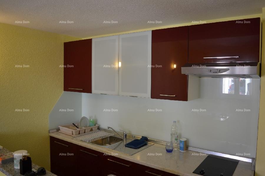 House with four separate apartments. 1 km to Verudela. 18