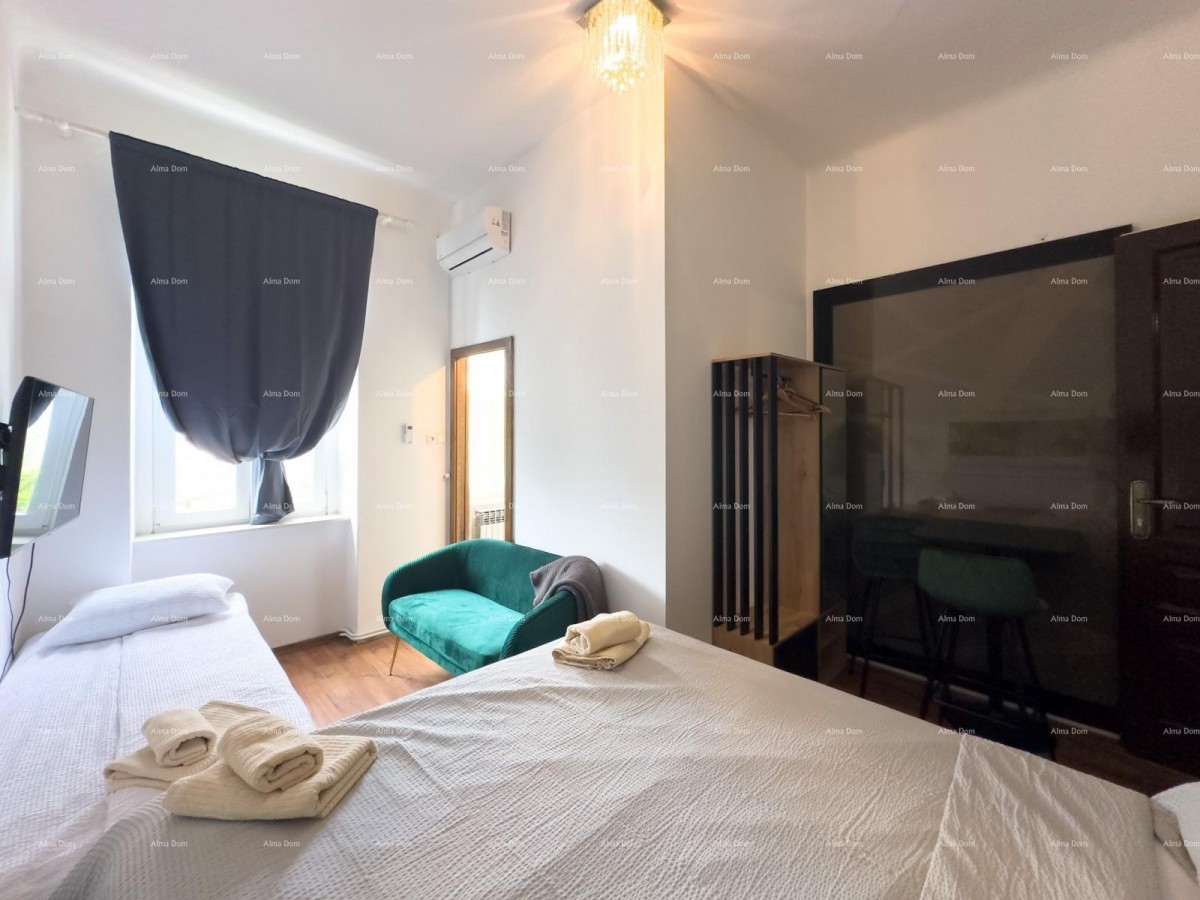 Sale of an apartment in the center with 4 residential units, Pula! 15