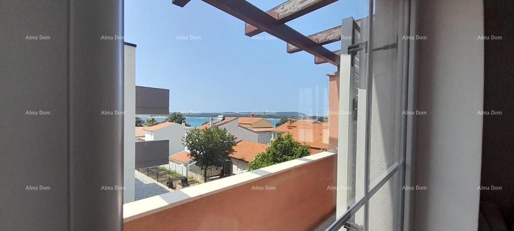 Eccellente opportunità! IMMOBILE CON PERMESSO DI UTILIZZO. Vendita esclusiva di un appartamento in posizione privilegiata con giardino e posto auto. Vista mare! Pošesi, Medulin!! 1