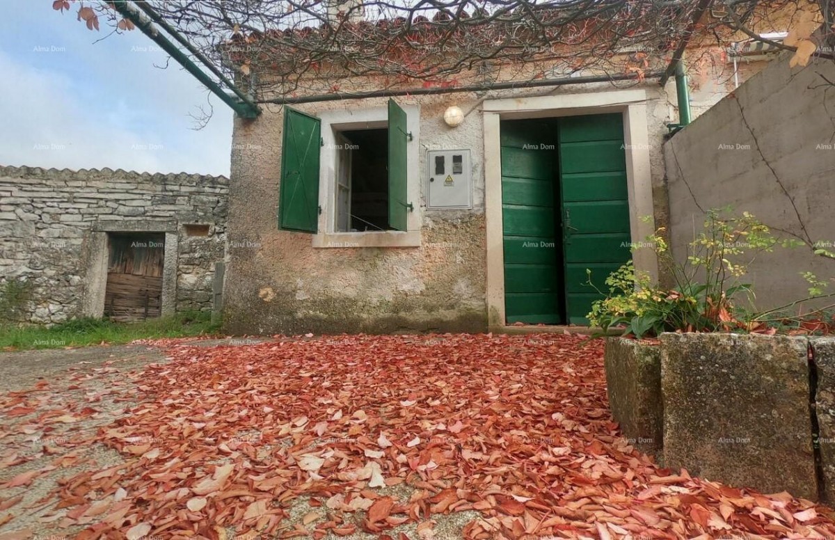 Rakalj, casa in pietra con 1.920 m² di terreno edificabile 1