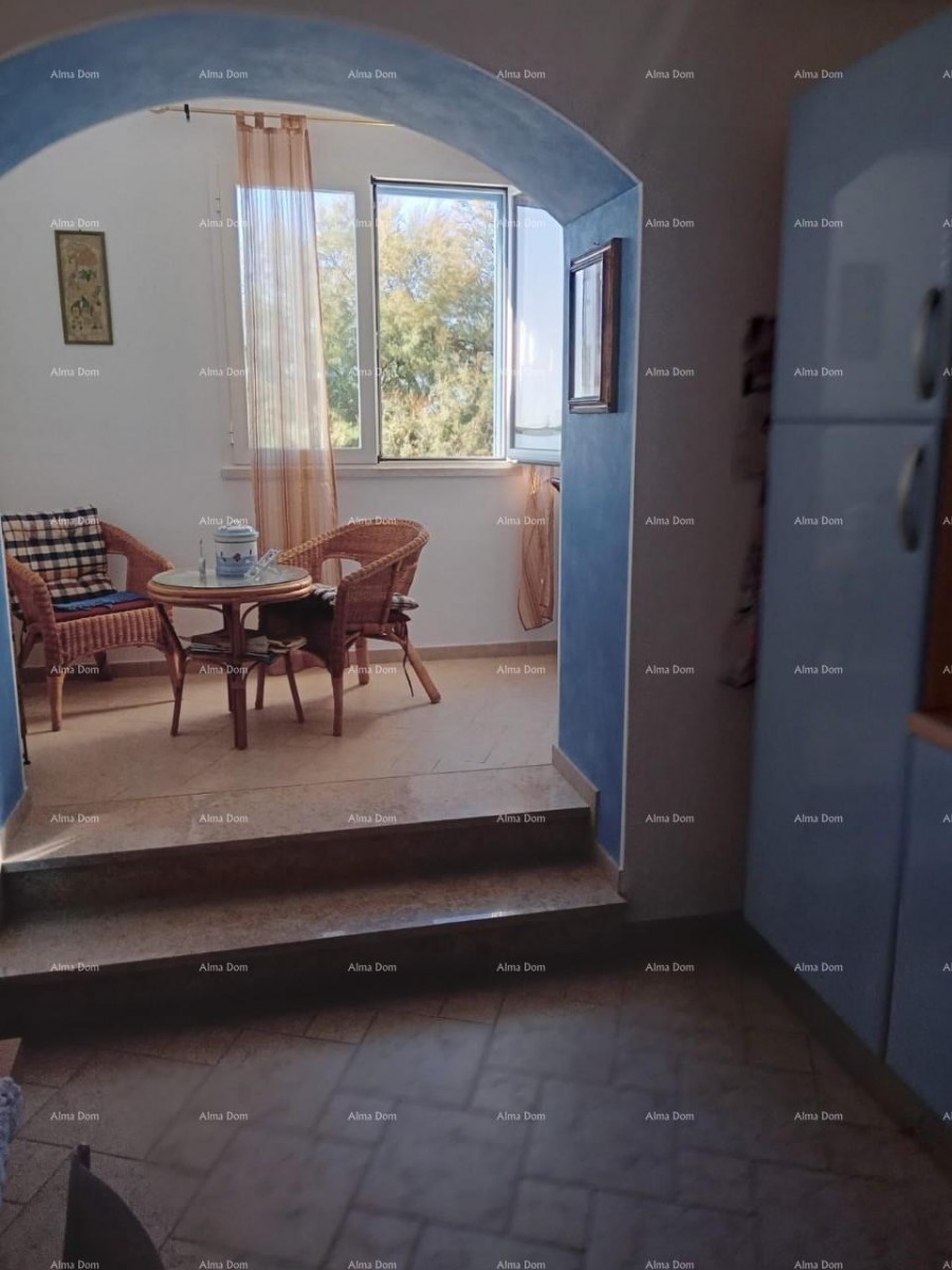 Proximity to the city of Umag. Duplex house for sale, 123.65 m² right on the seafront, 10 meters from the sea. 15