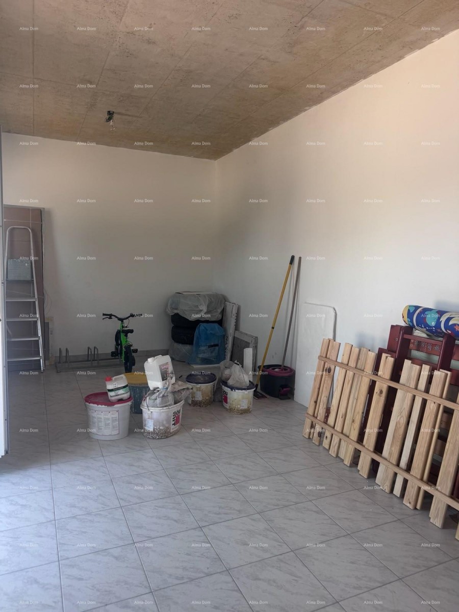Moderno trilocale con grande terrazza e 2 posti auto 18