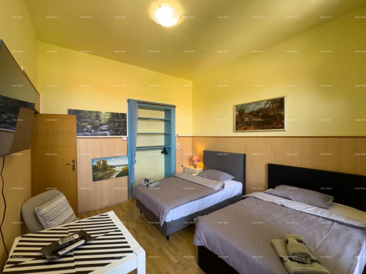 Sale of an apartment in the center with 4 residential units, Pula! 38