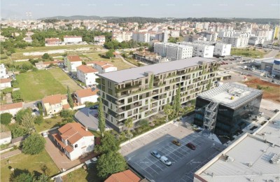Pula! Multi-family, modern building with an elevator, close to the center. Apartment with a large parking space S78.