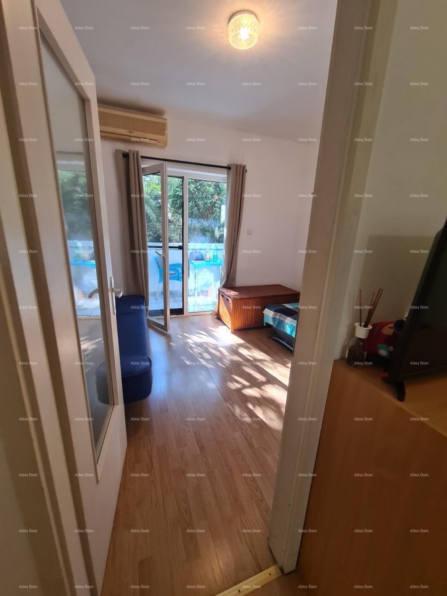 Appartamento al piano terra con loggia e piscina. Medulin. 11